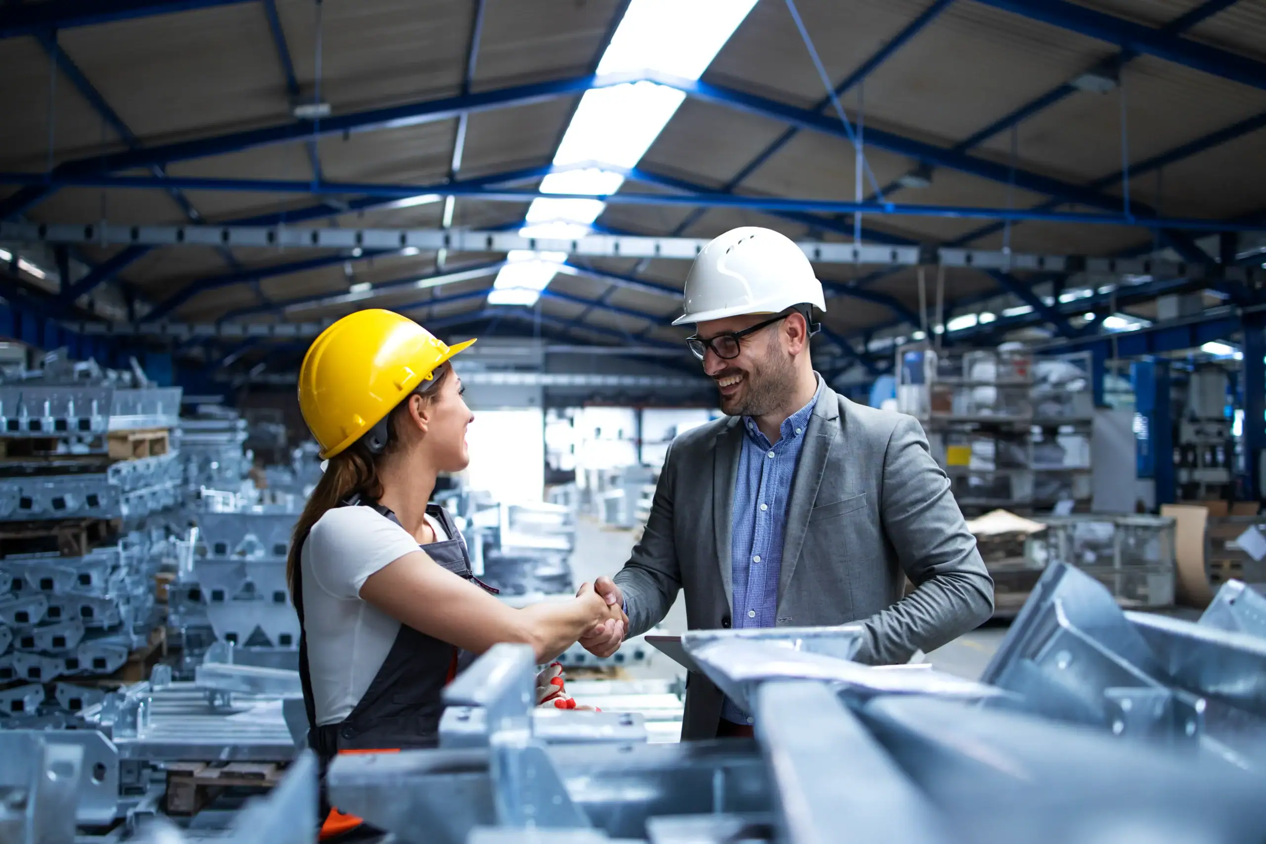 Manufacturing professionals building successful business partnerships